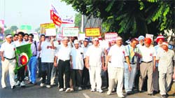 Members of the Senior Citizens Welfare Association take part in a goodwill march to mark the Senior Citizen Day in at Ludhiana on Saturday. 
