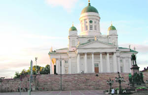 Senate Square is in the centre of Helsinki. The neo-classical, Lutheran St Nicholas church with its green dome is also part of the square Photos by the writer