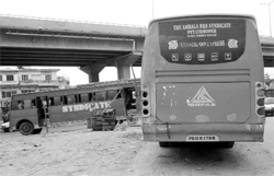 Syndicate buses parked on the road near Paras Down Town Mall in Zirakpur