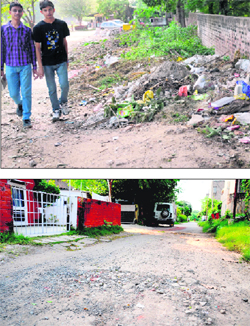 Garbage dumped along a wall in Sector 15; and (below) a potholed road on the PGI campus in Chandigarh