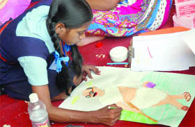 Schoolchildren take part in painting (left) 