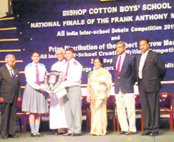 Students of the St. Josephs Academy being awarded the Frank Anthony Memorial All-India Inter-School Debate trophy at Bishop Cotton Boys' School, Bangalore, recently