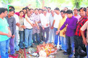 BJP workers hold a Buddhi Shuddhi Yajna on the issues of corruption and inflation in Dehradun on Sunday. 