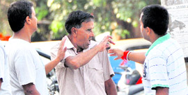 Hearing impaired persons discuss some issue on International Deaf Day in Ludhiana on Sunday.