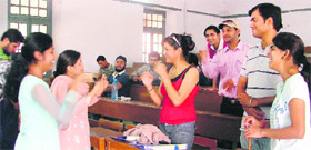 Members of the Ludhiana Deaf Friendship Club interact with one another at the SCD Government College on Sunday.