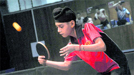 Harnoor Singh plays a shot during the junior boys final in the 22nd Prithipal Singh Memorial Open Table Tennis Tournament at the PAU in Ludhiana on Sunday.