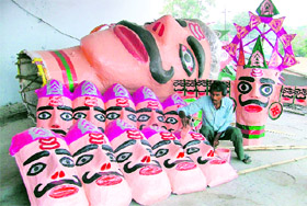 An effigy of Ravana being prepared by Agra-based artists at the Daresi ground in Ludhiana.