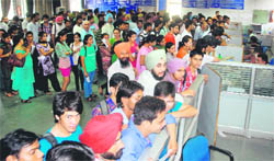 Crowded fee counters at the SBI branch on the Panjab University campus in Chandigarh