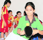 A player in action in the Inter-council Schools Junior Girls Table Tennis Championship in Dehradun