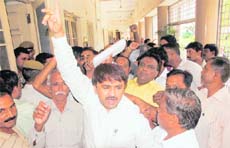 Members of the Uttarakhand Balmiki Krantikari Yuva Morcha hold a protest in Dehradun on Monday.