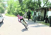 A cyclist takes part in the Hercules MTB-2011 rally on Monday.
