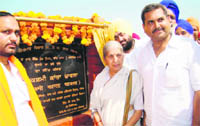 Laxmi Kanta Chawla, Women and Child Development Minister, inaugurates a bridge at Thandey village in Amritsar