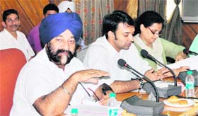 Gurcharan Singh Channi, Chairman of the District Planning Committee, addresses a meeting at the DC office in Jalandhar on Monday