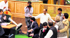 PDP legislators create a ruckus in the Assembly during a protest over the killing of National Conference worker Sayeed Yousuf.