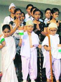 Students of Om Parkash Bansal Model School, Mandi Gobindgarh, celebrate Gandhi Jayanti on Monday.