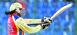 Chris Gayle of Royal Challengers Bangalore plays a shot during the Champions League Twenty20 match against Somerset in Bangalore on Monday.