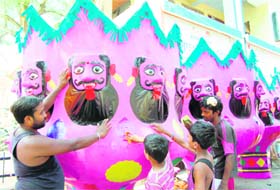 Artisan giving final touches to an effigy of Ravan in Amritsar