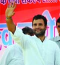 Rahul Gandhi waves at a rally in Rohini, New Delhi, on Tuesday. 