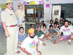 Baddi police personnel with the rescued youths at Chowkiwala on Monday