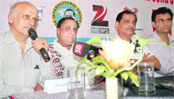 Film-maker Mukesh Bhatt (left) addresses a press conference in Katra