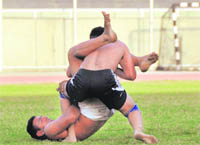 Players in action during a kabaddi match at Guru Nanak Stadium in Ludhiana on Tuesday.