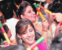 Girls perform dandiya at INIFD in Ludhiana. 