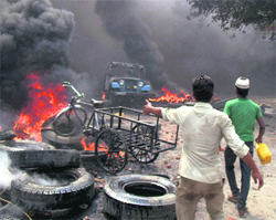 Irate protesters burn vehicles in Rudrapur town