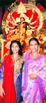 Bollywood actors Kajol and Tanisha Mukherji at the North Bombay Sarbojanin Durga Puja Pandal in Mumbai on Tuesday