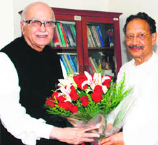 Uttarakhand Chief Minister BC Khanduri meets LK Advani at his residence in Delhi on Wednesday.