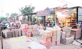 Dealers of crackers put up their stocks in temporary shops constructed inside Burlton Park in Jalandhar