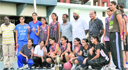 Winners of the Punjab Basketball League strike a pose in Ludhiana 