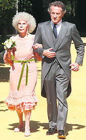 Spains Duchess of Alba, Cayetana Fitz-James Stuarty Silva, with her husband Alfonso Diez inside Las Duenas Palace after their wedding in Seville on Wednesday