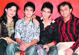The Chaturvedi family, Meenu an Anuj with their sons Rishab and Shivam. They performed at the Dandiya night in Amritsar.