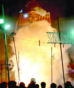 An effigy of Ravana set on fire by Prime Minister Manmohan Singh during Dussehra celebrations at the Ramlila Grounds in New Delhi on Thursday.
