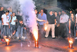 Actor Sanjay Dutt along with a team of Bollywood film Rascals in a festive mood outside a mall in Gurgaon.