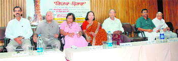 Dignitaries share the dais at a function to mark Vijay Divas in Kurukshetra. 