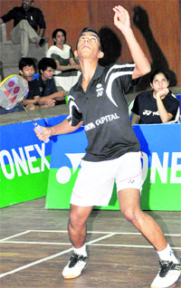 Arun George of Kerala readies for a shot during the boys under-17 final of the 21st Krishna Khaitan Memorial All-India Junior Ranking Badminton Tournament at the Panjab University gymnasium in Chandigarh on Friday