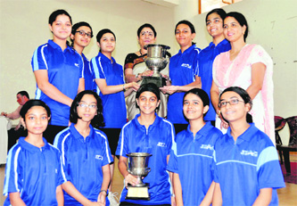 Senior and junior Welham Girls School teams pose with the trophies after winning the lnter-school Senior and Junior Girls Table Tennis Championship that concluded in Dehradun on Friday.