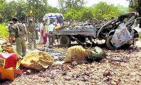 The debris of a Sashastra Seema Bal vehicle is seen on National Highway-16 after a powerful landmine blast triggered by Maoists on Friday near Geedam on the border of Dantewada and Jagdalpur districts.