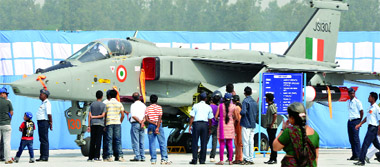 Visitors admire the Jaguar during the Indian Air Force Day celebrations at the IAF Station in Hindon, Ghaziabad, on the outskirts of New Delhi on Saturday.