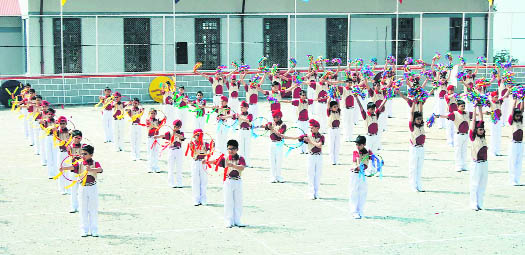 Students of Guru Nanak Fifth Centenary School give a PT display on the occasion of the Founders Day in Mussoorie on Saturday.