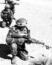 Soldiers from Gurkha rifles in action at a border post on the western front.