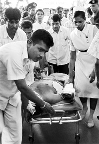 An injured is being taken to a hospital in Colombo