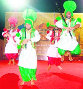 Bhangra artistes perform at the CII expo in Amritsar on Sunday