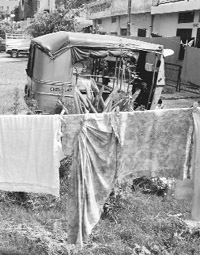 Apart from drying clothes in parks, residents park vehicles 