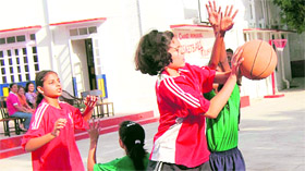 Players in action during the Tek Chand Memorial Basketball (Under 12) Tournament at Doon Girls School in Dehradun on Sunday.