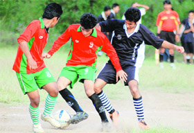 Players in action in the 13th Col Sashi Shamsher JB Rana Memorial Inter-School Football Tournament played at Cambrian Hall School in Dehradun on Sunday.