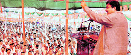 BJP National president Nitin Gadkari addresses party workers at Parade Ground in Dehradun on Sunday.