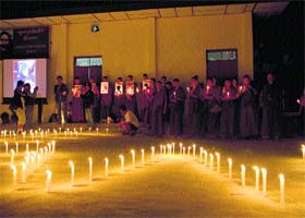Tibetans hold a candlelight protest at McLeodganj in Dharamsala