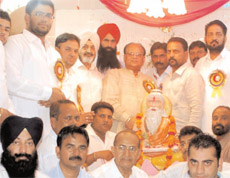 Former DGP Paramdeep Singh Gill along with the local Congress MLA Joginder Pal Jain during a Shobha Yatra organised on the eve of the Valmiki Jayanti at Moga on Monday.